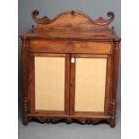 A REGENCY ROSEWOOD CHIFFONIER, early 19th century, the beaded edged top with raised back with boldly
