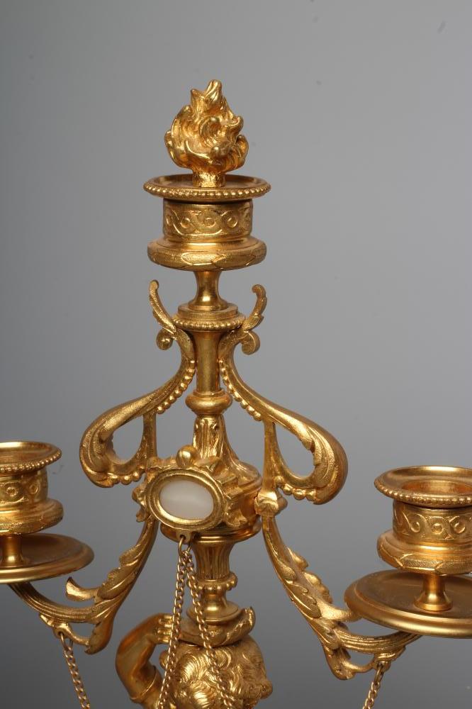 A PAIR OF FRENCH GILT METAL THREE LIGHT FIGURAL CANDELABRA inset with onyx panels, early 20th - Image 4 of 4
