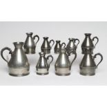 NINE VARIOUS PEWTER HAYSTACK MEASURES, including a quart, two pints, three half pints, two noggins