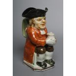 A PEARLWARE "WARTY FACE" TOBY JUG, c.1790, wearing a black tricorn hat, slight ochre colouring to