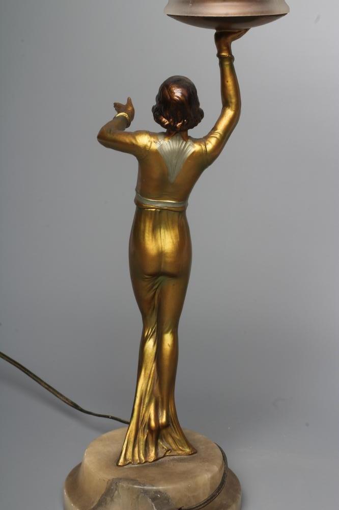 AN ART DECO BRONZED SPELTER FIGURAL ELECTRIC LAMP BASE modelled as a young lady with shingled - Bild 4 aus 4