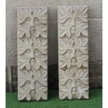 A PAIR OF CARVED SANDSTONE GREEN MAN WALL PANELS of oblong form each with three masks, 8" x 25" (