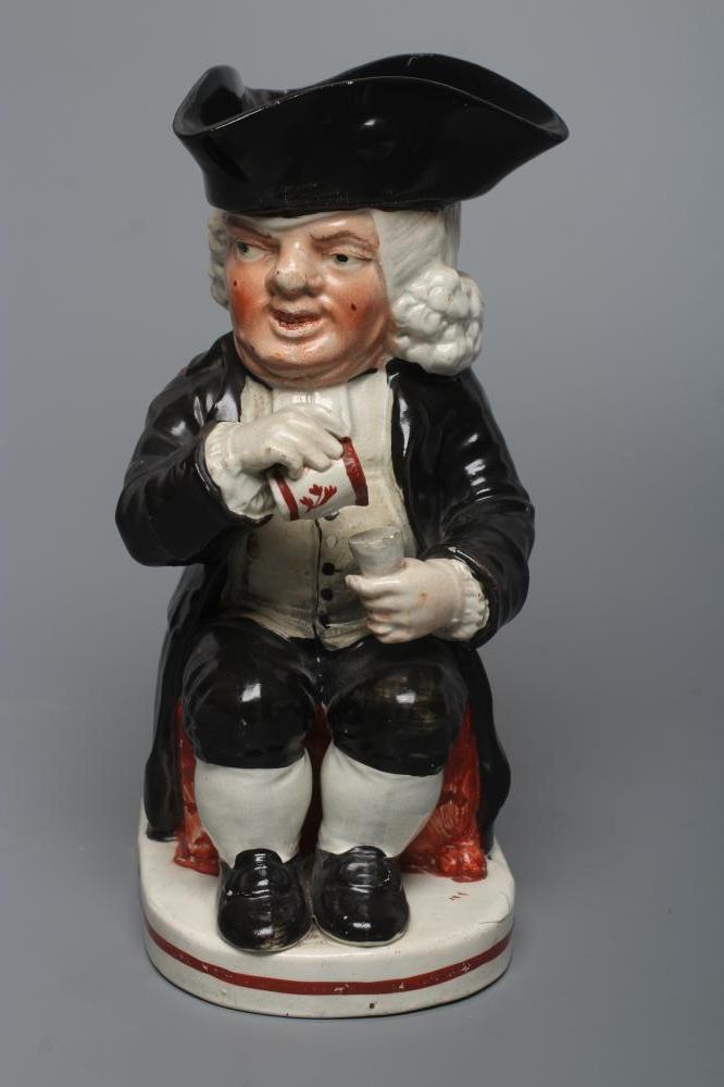 AN ENOCH WOOD TYPE EARTHENWARE DRUNKEN PARSON OR DR. JOHNSON TOBY JUG, c.1800, wearing a black - Image 2 of 5