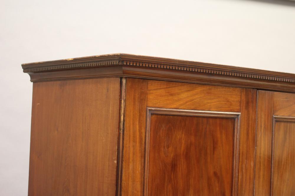 A GEORGIAN MAHOGANY LINEN PRESS, third quarter 18th century, the dentil moulded cornice over two - Image 2 of 3