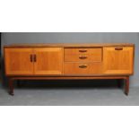 A TEAK LONG SIDEBOARD BY G PLAN, mid 20th century, with formosa teak trim and loop handles,