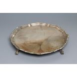 A SMALL SALVER, maker Thomas Bradbury & Sons Ltd., London 1915, of shaped circular form with