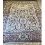 AN INDIAN WOOL CARPET, modern, in the Persian style, the ivory field with repeating scrolling