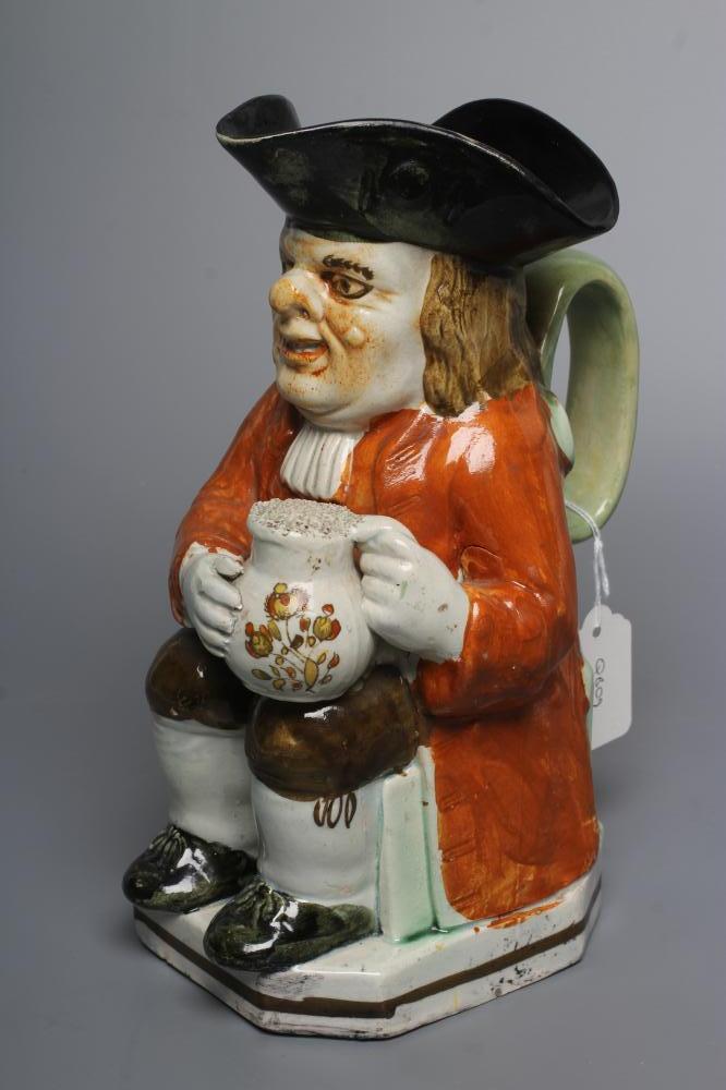 A PEARLWARE "WARTY FACE" TOBY JUG, c.1790, wearing a black tricorn hat, slight ochre colouring to - Image 2 of 3