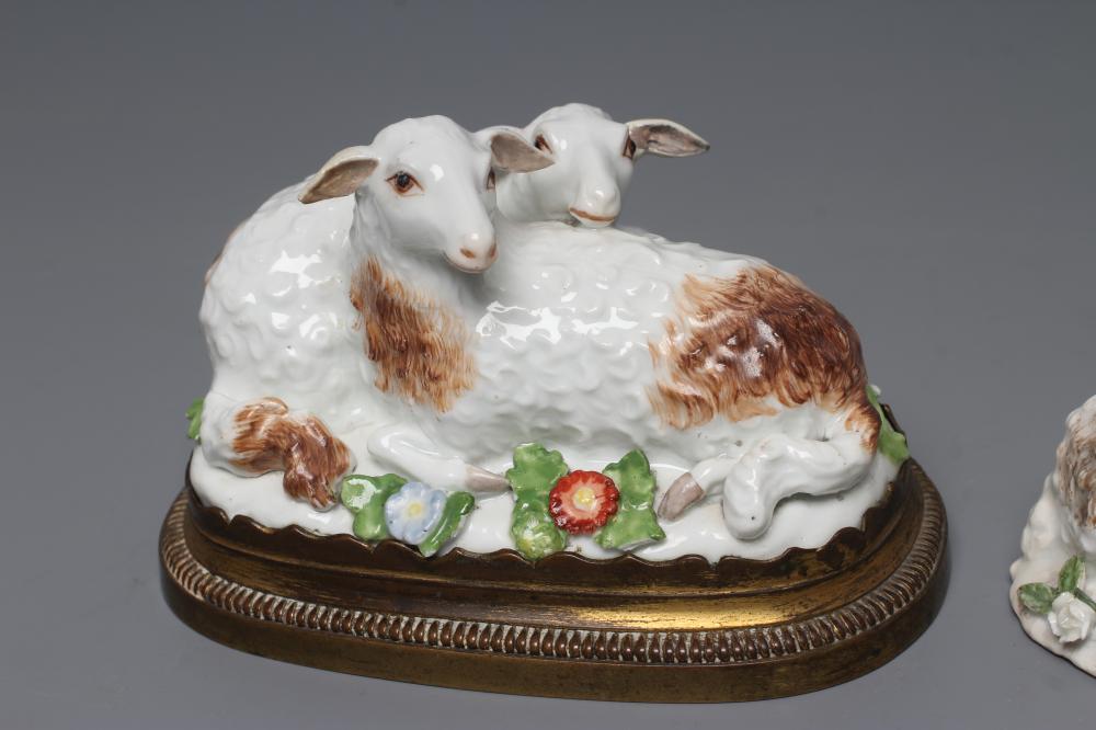 A MEISSEN PORCELAIN GROUP, early 19th century, modelled as two recumbent sheep on a flower encrusted - Image 2 of 5