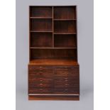 A ROSEWOOD TWO STAGE BOOKCASE, mid 20th century, the upper section with straight top and chamfered