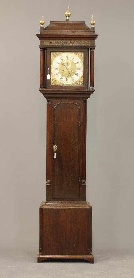 AN OAK LONGCASE CLOCK by P Clare, Manchester, the eight day movement with anchor escapement striking