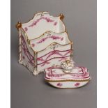 A DRESDEN PORCELAIN LETTER RACK AND MATCHING ROCKER BLOTTER, 20th century, painted on-glaze en