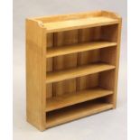 A ROBERT THOMPSON ADZED OAK OPEN BOOKCASE of oblong form with three quarter galleried top, three