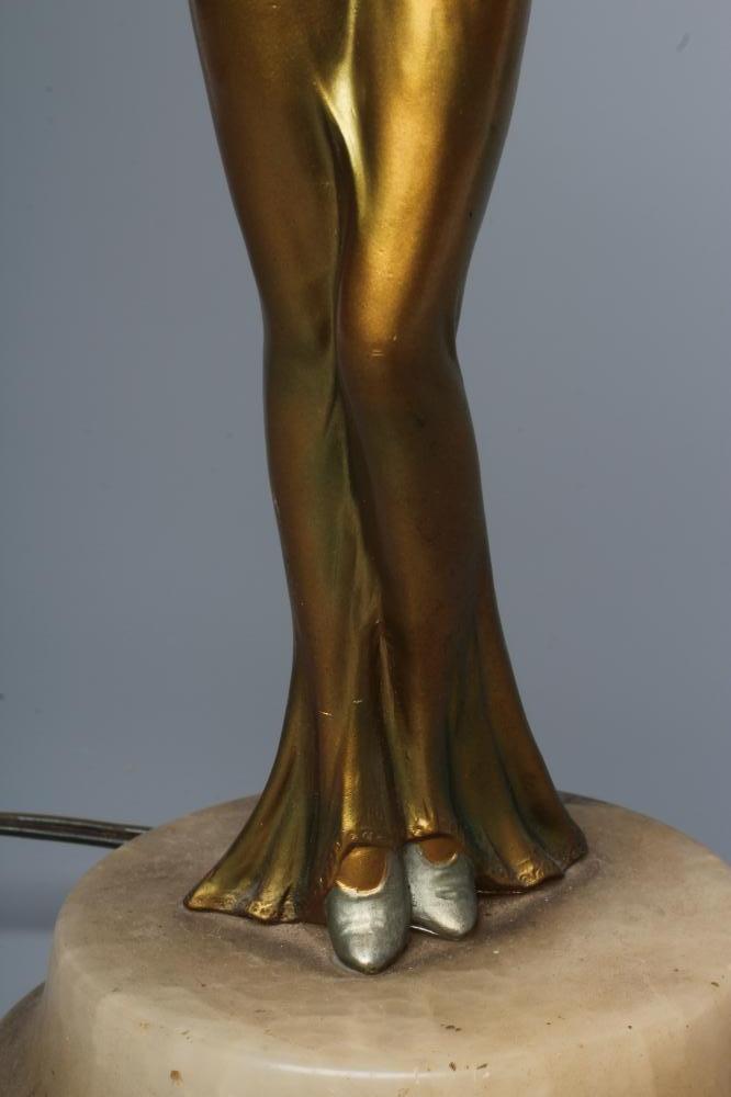 AN ART DECO BRONZED SPELTER FIGURAL ELECTRIC LAMP BASE modelled as a young lady with shingled - Bild 3 aus 4