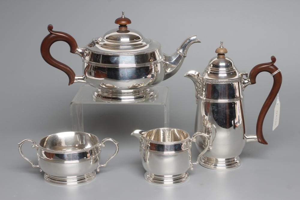 A FOUR PIECE TEA SERVICE, maker Fattorini & Sons, Birmingham 1930 and 1931 (hot water jug), of squat