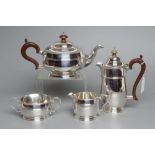 A FOUR PIECE TEA SERVICE, maker Fattorini & Sons, Birmingham 1930 and 1931 (hot water jug), of squat