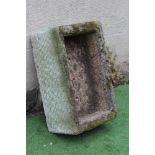 A SANDSTONE TROUGH of well cut oblong form with line banding, 27 1/2" x 17" x 11" (Est. plus 24%