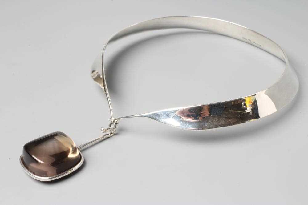 A GEORG JENSEN SILVER NECK RING designed by Vivianna Torun Bulow-Hube, with tension clamp and hung - Image 4 of 4