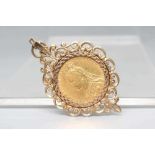 A VICTORIA J.H. SOVEREIGN, 1888, in a 9ct gold loose pendant mount, London 1974, 13.6g (Est. plus