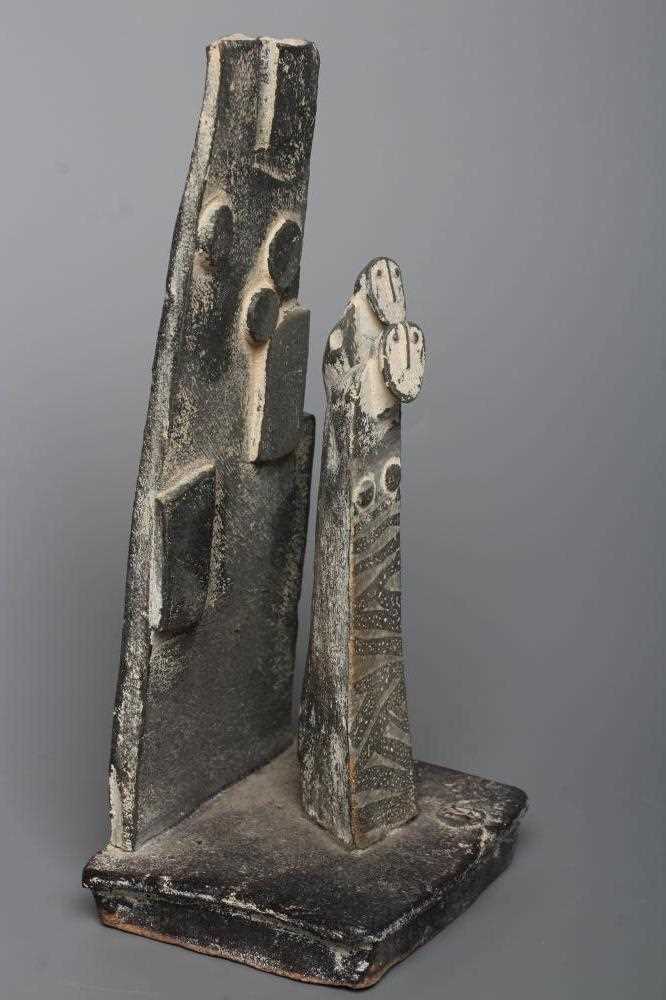 Y JOHN MALTBY (1936-2000) - a matt grey stoneware sculpture of two figures standing before a cut - Image 3 of 16