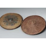 TWO AFRICAN HIDE SHIELDS, possibly Somalian, of circular form, with embossed geometric design and