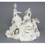 A NYMPHENBURG BLANC-DE-CHINE PORCELAIN FIGURE GROUP, c.1900, modelled as a young couple in hunting