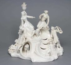 A NYMPHENBURG BLANC-DE-CHINE PORCELAIN FIGURE GROUP, c.1900, modelled as a young couple in hunting