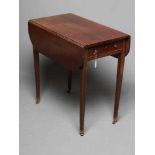 A MAHOGANY(?) PEMBROKE TABLE, c.1800, the rounded oblong top over frieze drawer with turned brass