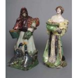 SIDNEY KEATS COPE - a pair of slip cast pottery figures in the style of Charles Vyse, modelled as