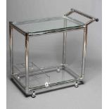 AN ART DECO CHROME TROLLEY of oblong two tier form with glass shelves, chrome bottle housing and