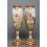 A PAIR OF ROYAL DOULTON CHINA GARNITURE VASES, 1920's, of slender ovoid form raised upon cluster