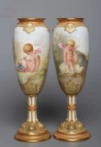 A PAIR OF ROYAL DOULTON CHINA GARNITURE VASES, 1920's, of slender ovoid form raised upon cluster