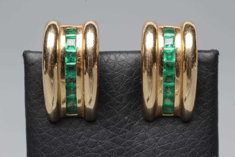 A PAIR OF EMERALD FRENCH CLIP EARRINGS to match the previous lot, each set with eight stones,