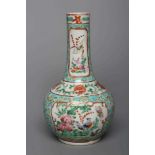 A CHINESE PORCELAIN BOTTLE VASE painted in colours with panels of flowers, birds and butterflies