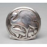 A GEORG JENSEN SILVER CIRCULAR BOSS BROOCH designed by Hugo Lisberg, chased with a stork, stamped