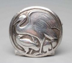 A GEORG JENSEN SILVER CIRCULAR BOSS BROOCH designed by Hugo Lisberg, chased with a stork, stamped