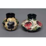 A MOORCROFT POTTERY PRETTY PENNY PATTERN VASE, 2015, of squat baluster form tubelined and painted in