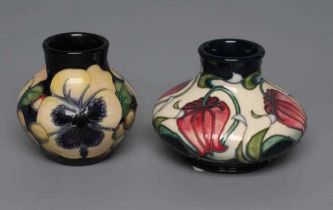 A MOORCROFT POTTERY PRETTY PENNY PATTERN VASE, 2015, of squat baluster form tubelined and painted in