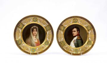 A PAIR OF ROSENTHAL PORCELAIN CABINET PLATES, c.1900, of plain circular form, centrally painted in