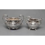 A LATE GEORGE III IRISH SILVER MILK JUG AND SUGAR BOWL, maker's mark I.S. and stamped WEST, of