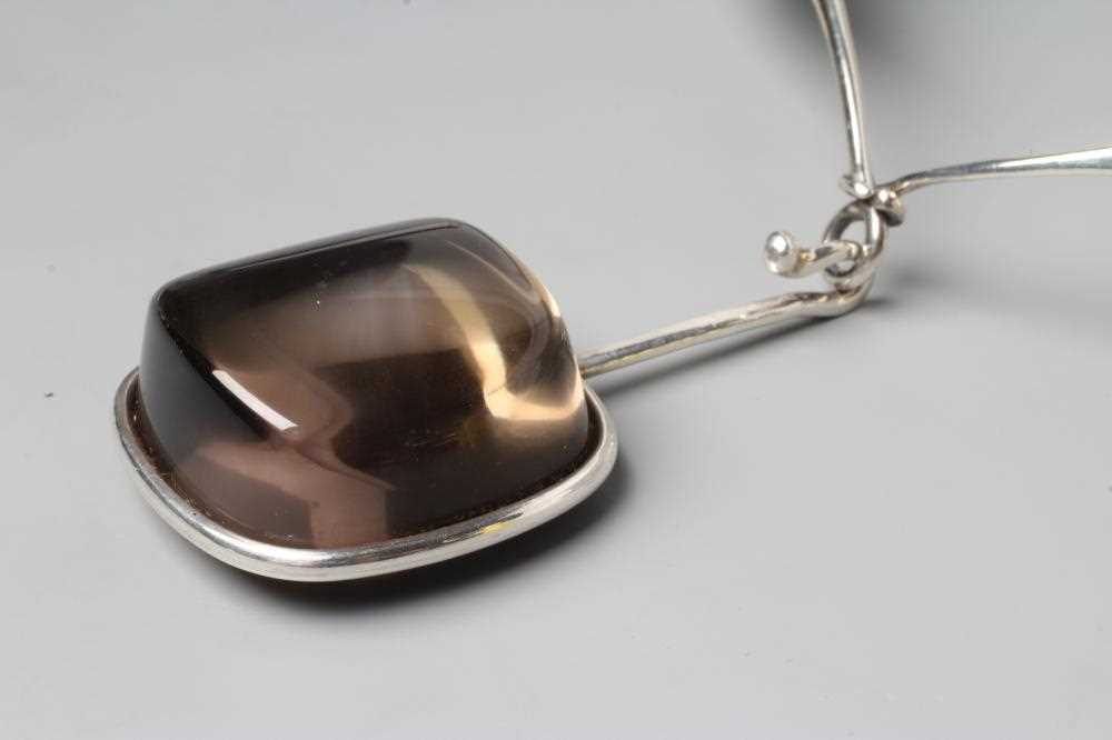 A GEORG JENSEN SILVER NECK RING designed by Vivianna Torun Bulow-Hube, with tension clamp and hung - Image 2 of 4