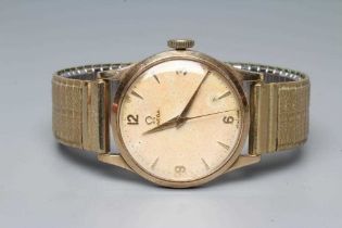 A GENTLEMAN'S 9CT GOLD OMEGA WRISTWATCH, the champagne dial with gilt metal Arabic quarter
