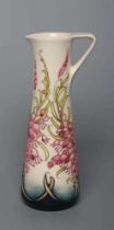 A MOORCROFT POTTERY CORNISH HEATH PATTERN EWER, 2018, of tapering cylindrical form, tubelined and