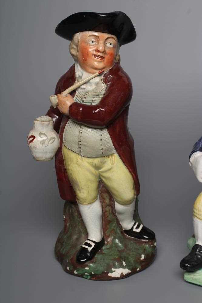 A STAFFORDSHIRE POTTERY SQUIRE TOBY JUG, early 20th century, wearing a black tricorn hat, underglaze - Image 3 of 4