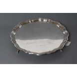 A SILVER SALVER, maker's mark J. D. & S., Sheffield 1947, of shaped circular form with pie-crust