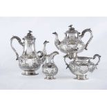 A VICTORIAN SILVER FOUR PIECE TEA AND COFFEE SERVICE, maker Hands & Son, London 1863, of baluster