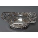 AN EDWARDIAN SILVER DISH, maker C.C. Pilling, London 1902, of quatrefoil form with scroll piercing