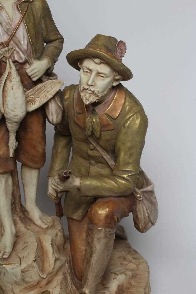 A ROYAL DUX BISQUE PORCELAIN FIGURE GROUP, early 20th century, modelled as a father holding a double - Image 3 of 5