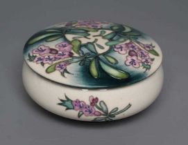 A MOORCROFT POTTERY MEADOW THYME PATTERN BOX AND COVER, 2016, of squat globular form, tubelined