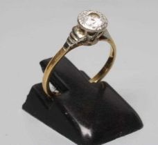 A SOLITAIRE DIAMOND RING, the round brilliant cut stone of approximately 0.30cts, illusion set to